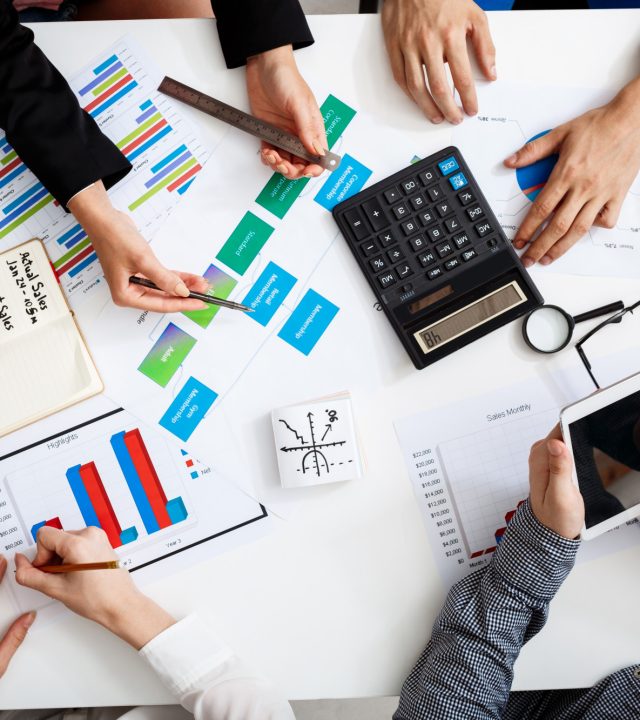 businessmen-hands-white-table-with-documents-drafts-1.jpg